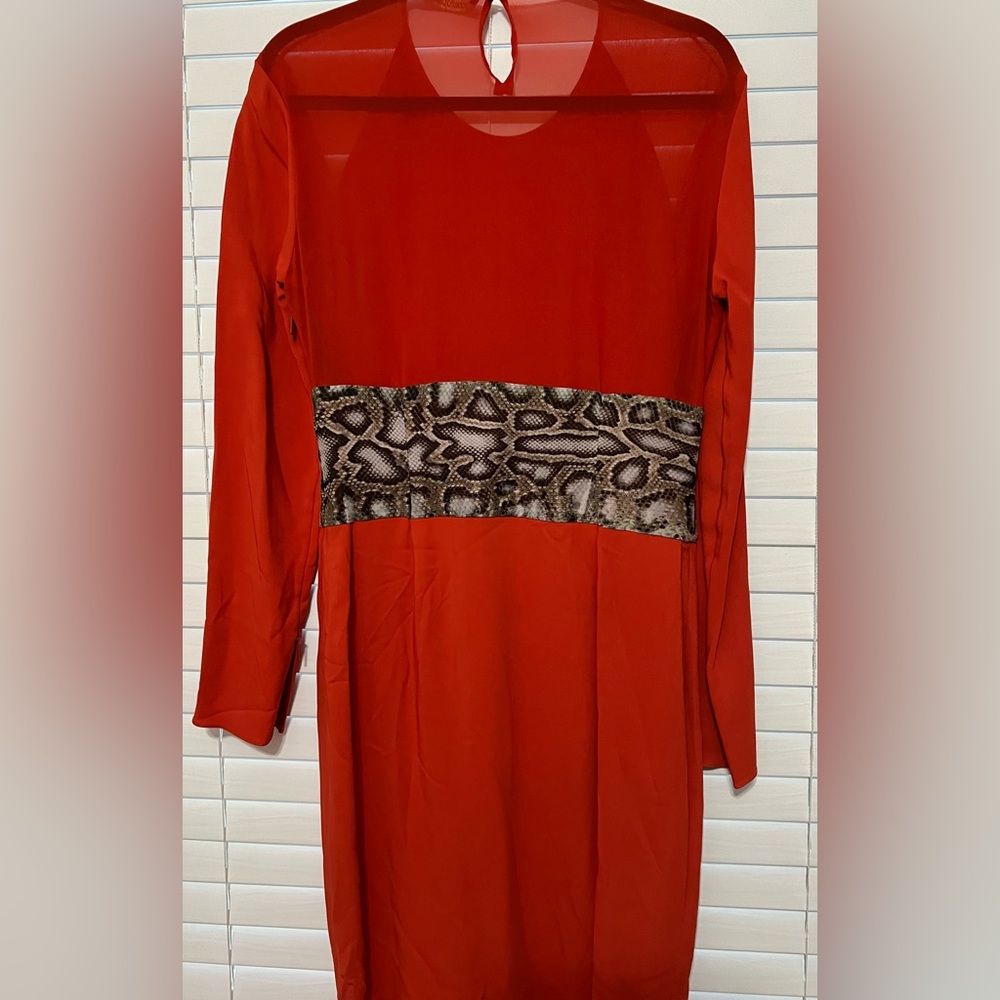 Gorgeous Roberto Covalli red dress with sleeve detail, animal print waistband.